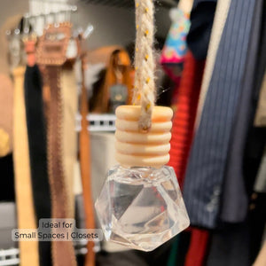 Essential oil car diffuser hanging in closet breathe well aromatherapy