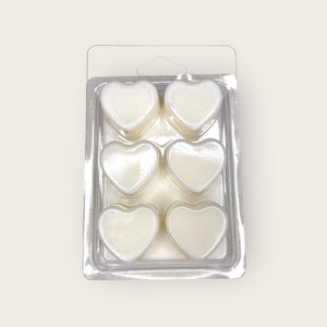 Fig & Field Soy Wax Melts in a plastic clamshell container with earthy scents of fresh grass, fig, and basil for a calming ambiance. - Breathe Well Aromatherapy